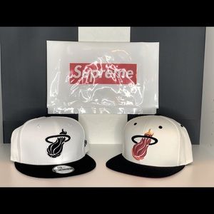 Two Miami heat new era snap backs.